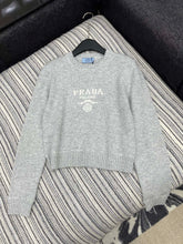 Diamond chain crewneck knit long-sleeved top