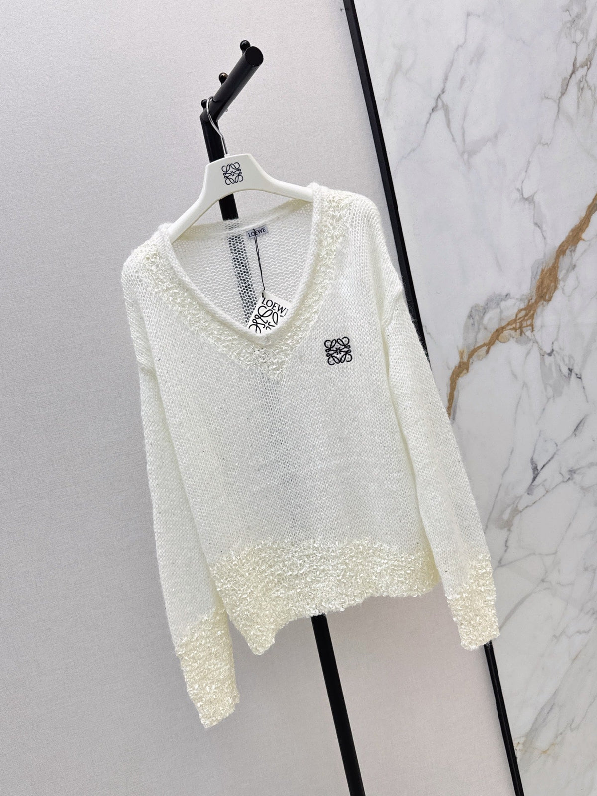 26FW Long-sleeve knit top with cut-out detail and new logo embroidery 🤍