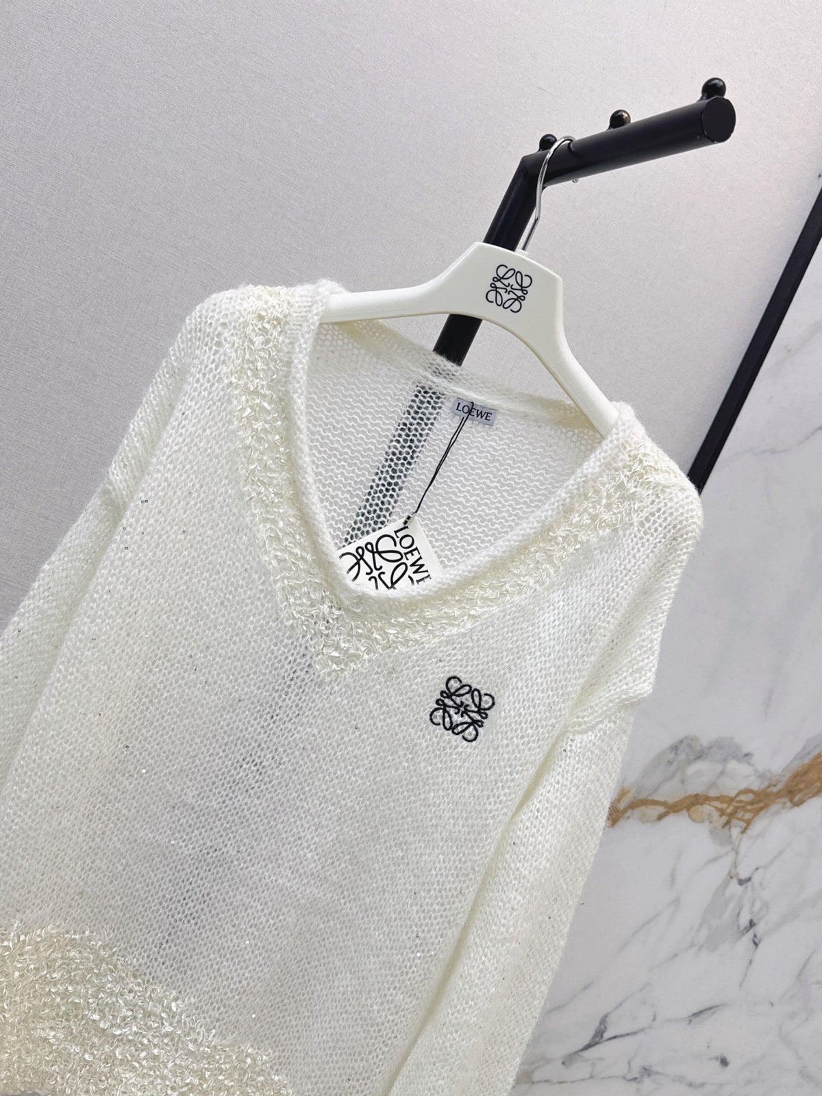 26FW Long-sleeve knit top with cut-out detail and new logo embroidery 🤍